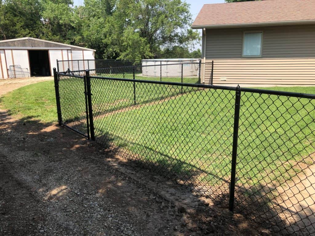 black chain link fence backyard