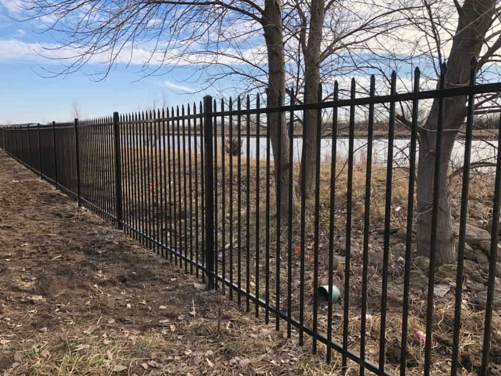 iron fence black along pond